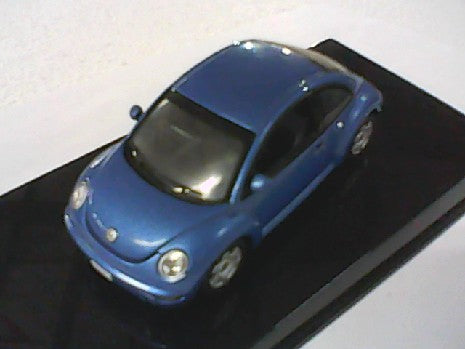 VW NEW BEETLE BLEU