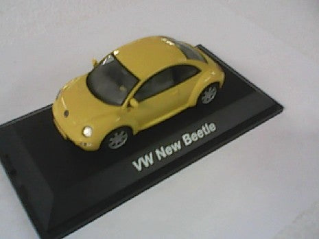 VW NEW BEETLE JAUNE 1/43