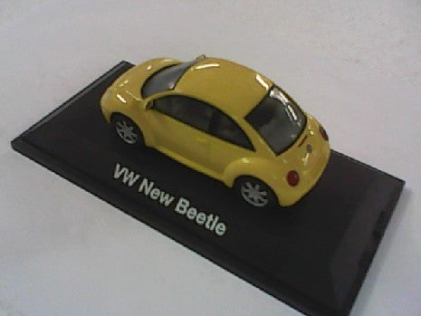 VW NEW BEETLE JAUNE 1/43